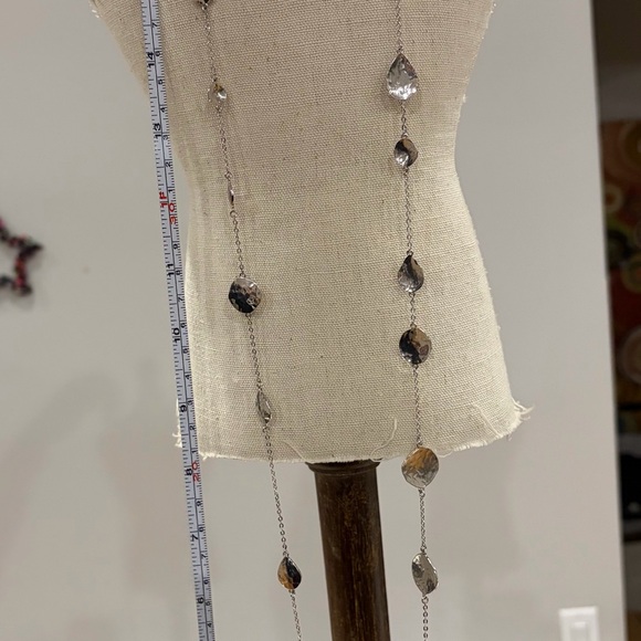 Melinda Maria Silver Tone
Hammered Disc Long Strand necklace - Picture 2 of 2